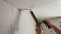 This Bath Had Peeling Molding, a Drop Ceiling, and Pink Grout — Now It's Classic